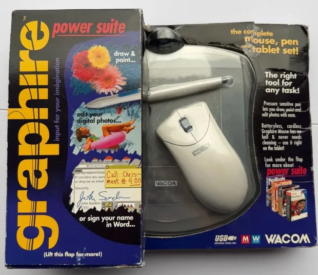A boxed Wacom Graphire Power Suite: the pen and cordless mouse packed over the tablet, with draw and paint promises printed down the side.